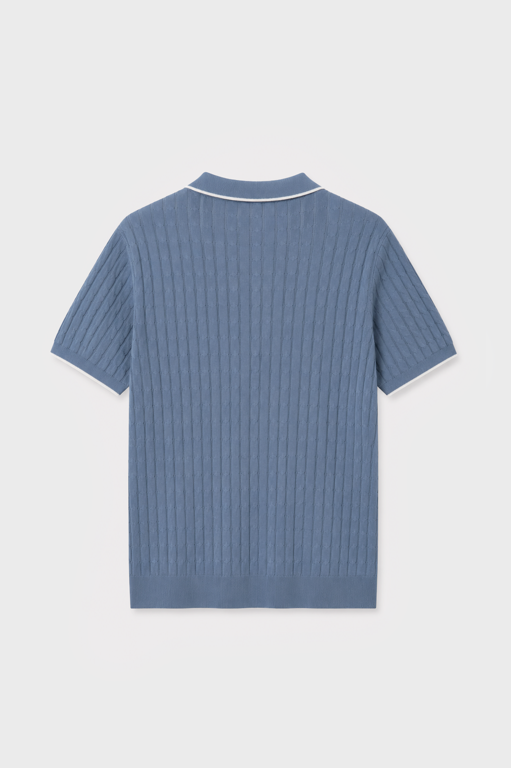 POLO TRICOT NUDOS CELESTE