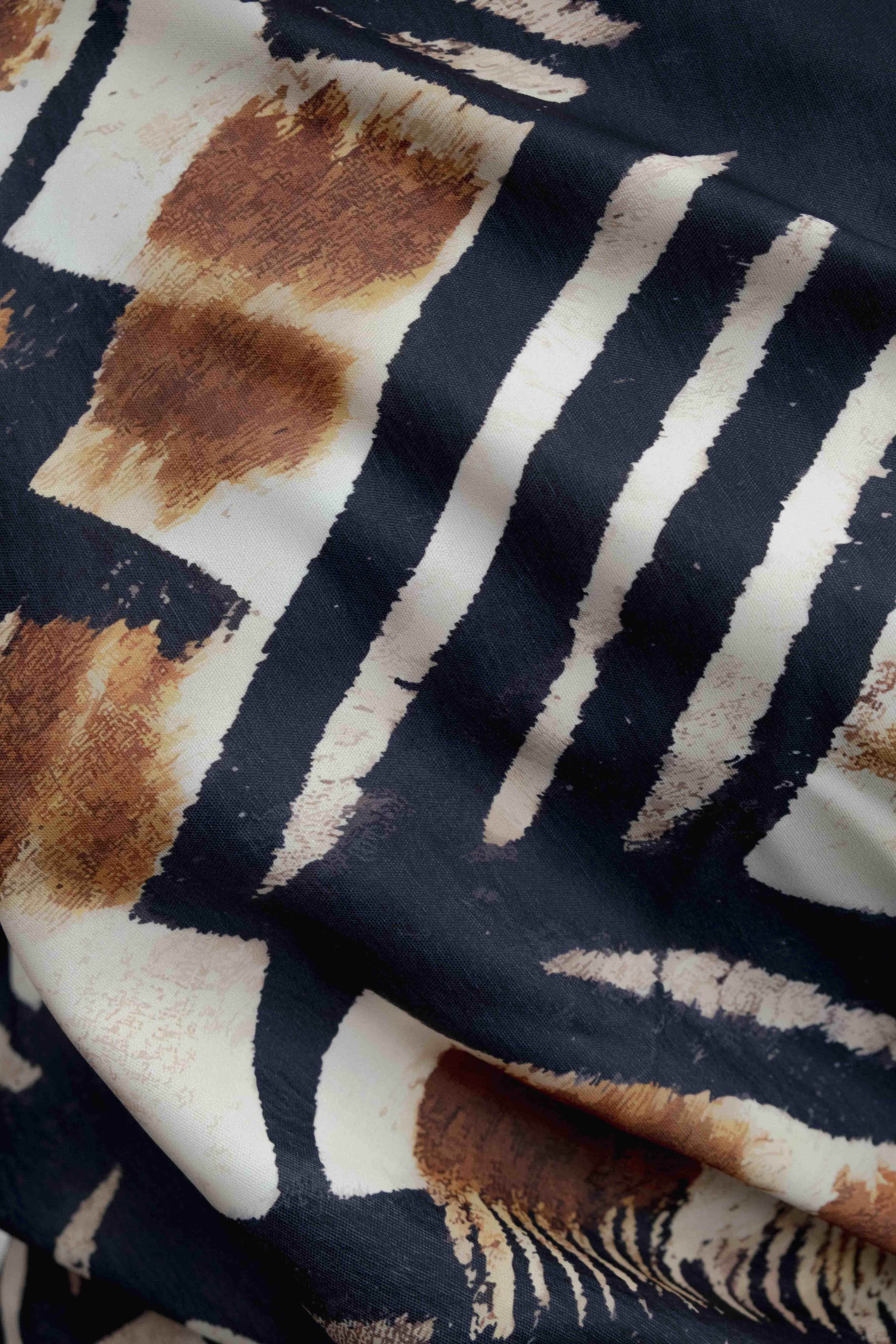CUERPO ASIMÉTRICO ESTAMPADO